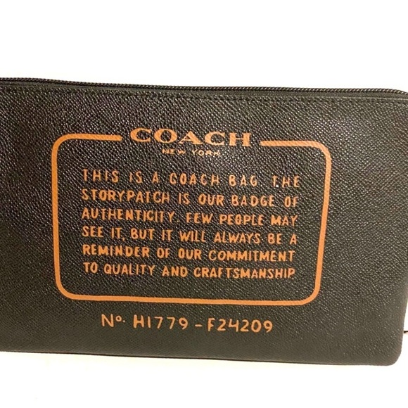 Coach black saffiano leather wristlet